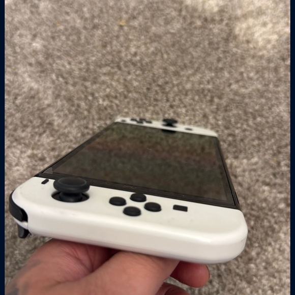 Nintendo Handheld Console in White and Black OLED